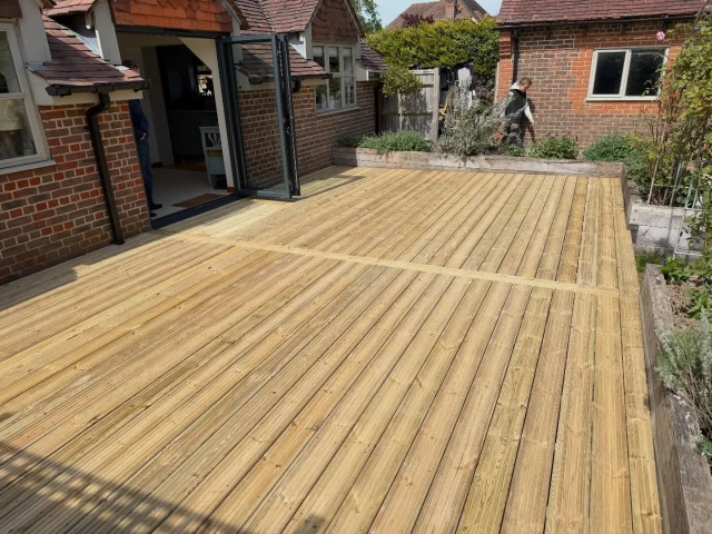 Decking with aluminium invisifold door #fpjcarpentry #winchester