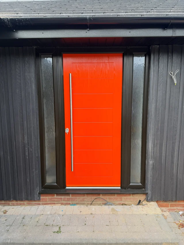 A very striking composite front door and cladding  #fpjcarpentry